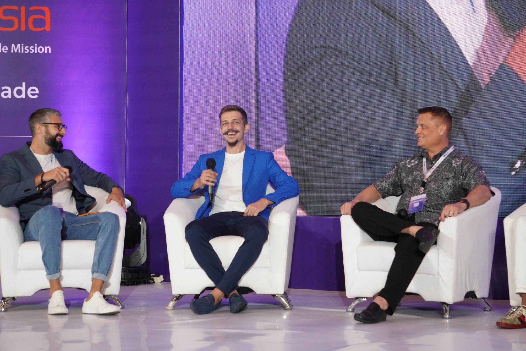 Cosmo smiling during a Trade Expo Indonesia panel